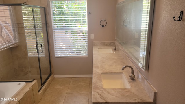 bathroom featuring vanity, tile patterned floors, and separate shower and tub