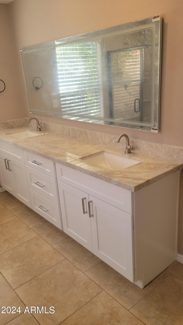 bathroom featuring vanity and tile patterned floors