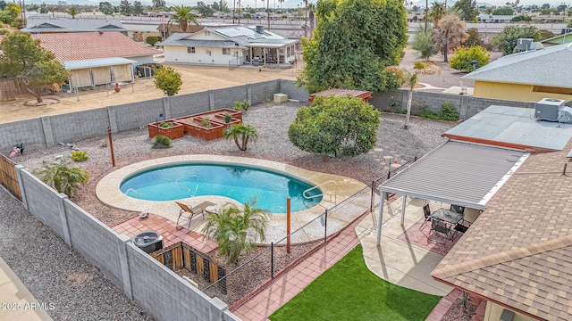 view of swimming pool with a gazebo and a patio area