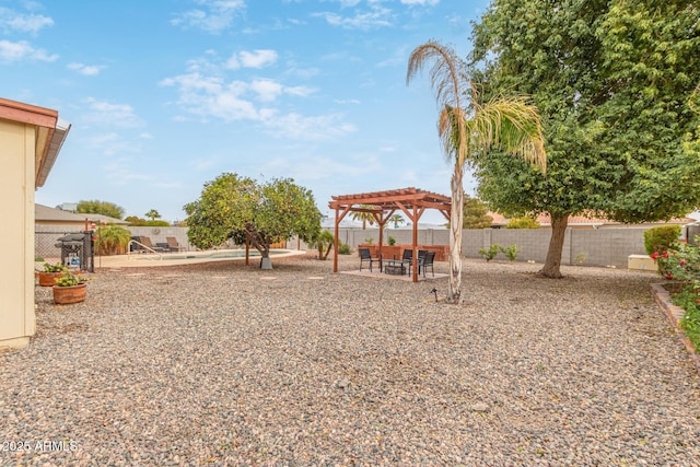 view of yard with a pergola and a patio