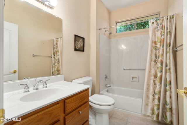 full bathroom featuring vanity, tile patterned flooring, toilet, and shower / tub combo with curtain