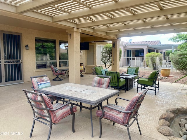 view of patio featuring a pergola