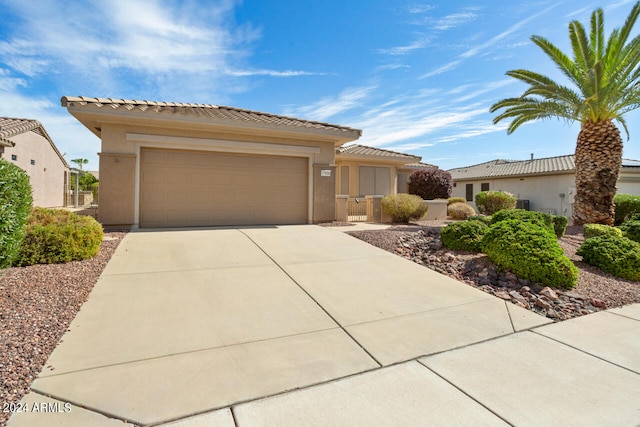 view of front of home featuring a garage