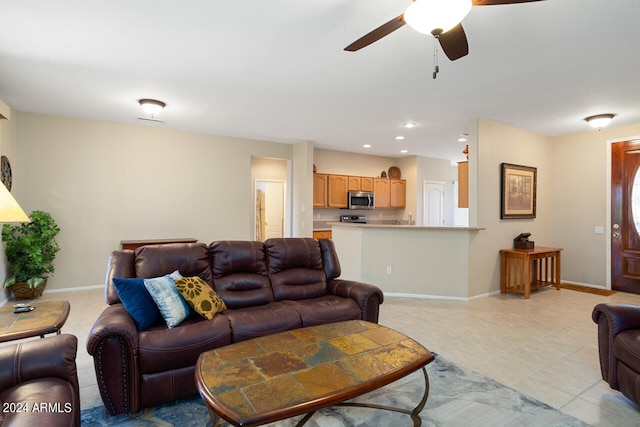 living room featuring ceiling fan