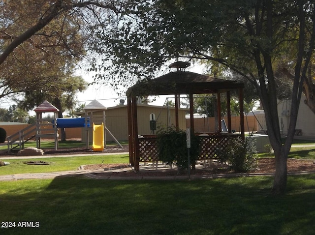 view of jungle gym with a gazebo and a yard