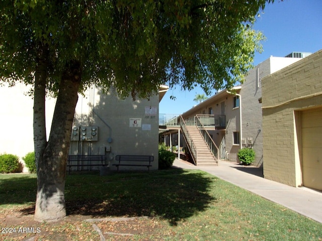 view of yard featuring a garage