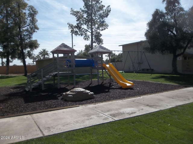 view of play area with a yard