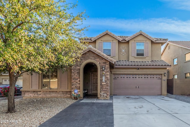 view of front of home with a garage