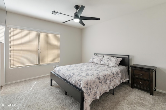 5917 N 133rd Ave, Litchfield Park, AZ 85340 - carpeted bedroom with visible vents, multiple windows, a ceiling fan, and baseboards