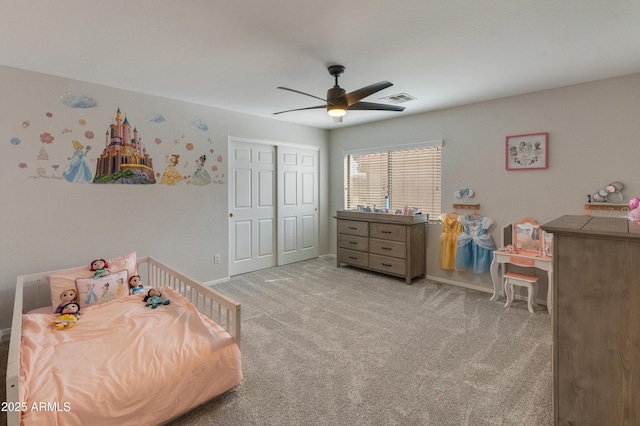 5917 N 133rd Ave, Litchfield Park, AZ 85340 - carpeted bedroom featuring a closet, visible vents, a ceiling fan, and baseboards