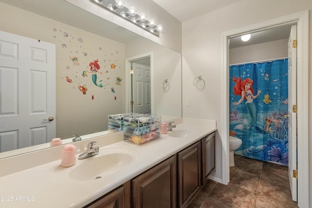 5917 N 133rd Ave, Litchfield Park, AZ 85340 - full bathroom with double vanity, toilet, tile patterned floors, and a sink