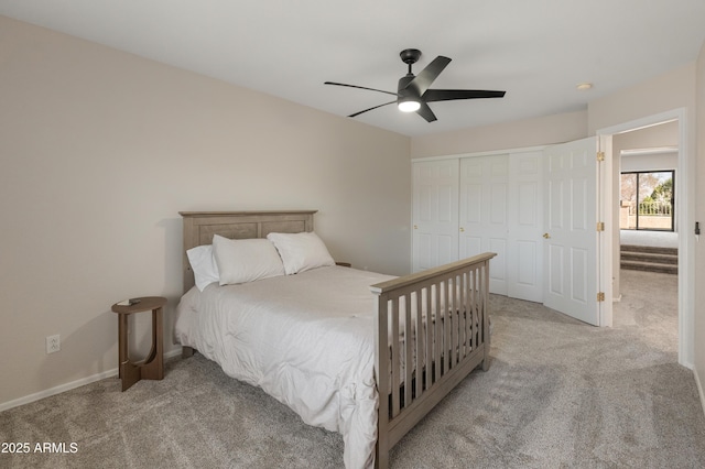 5917 N 133rd Ave, Litchfield Park, AZ 85340 - carpeted bedroom with a closet, baseboards, and a ceiling fan