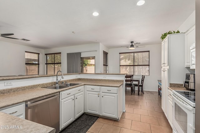 609 S 122nd Dr, Avondale, AZ 85323 - kitchen featuring white appliances, a ceiling fan, white cabinetry, light tile patterned floors, and light countertops