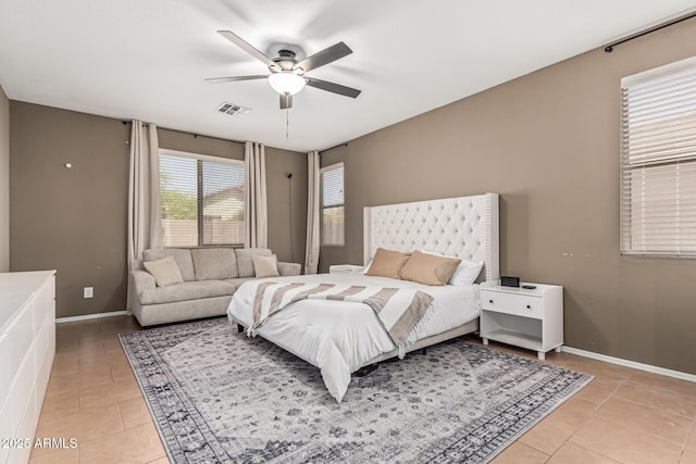 609 S 122nd Dr, Avondale, AZ 85323 - bedroom with light tile patterned flooring and ceiling fan