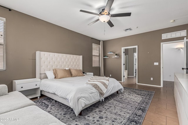 609 S 122nd Dr, Avondale, AZ 85323 - bedroom featuring light tile patterned flooring and a ceiling fan