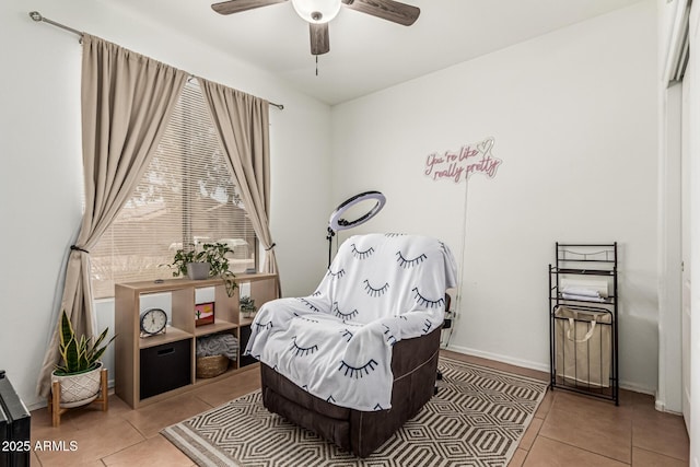 609 S 122nd Dr, Avondale, AZ 85323 - living area with tile patterned flooring and ceiling fan