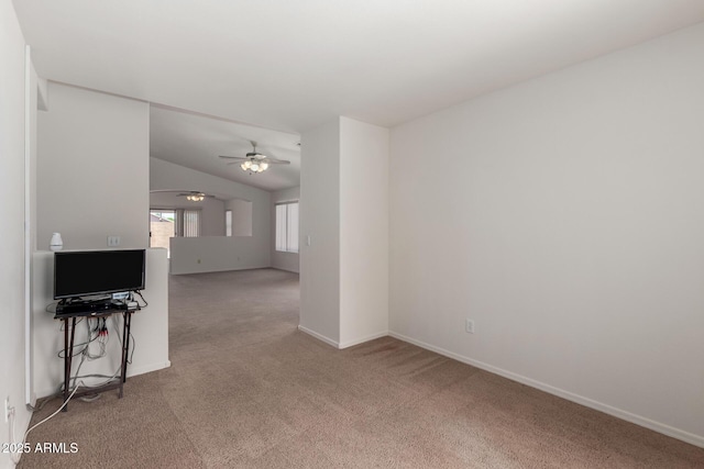 14936 W Maui Ln, Surprise, AZ 85379 - unfurnished living room featuring carpet, ceiling fan, and lofted ceiling
