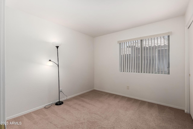 14936 W Maui Ln, Surprise, AZ 85379 - carpeted spare room featuring baseboards