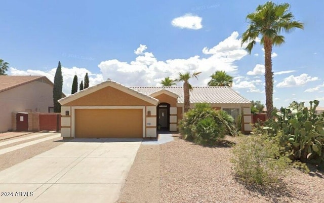 view of front of property featuring a garage