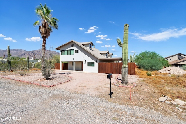 view of front of house featuring a mountain view