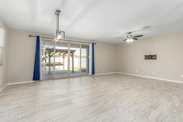 unfurnished room with ceiling fan