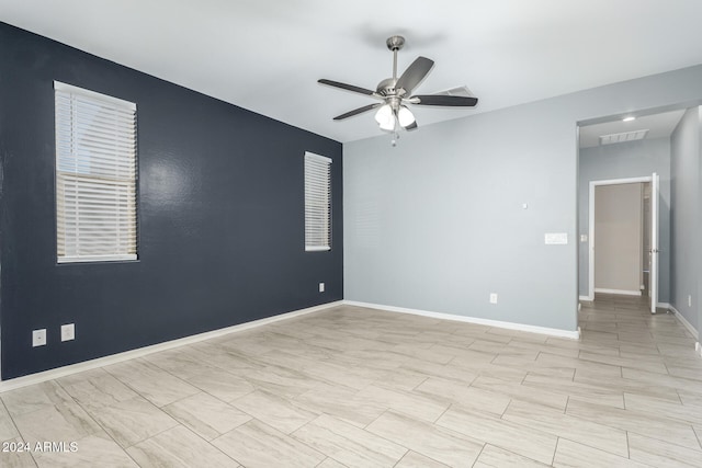 empty room featuring ceiling fan