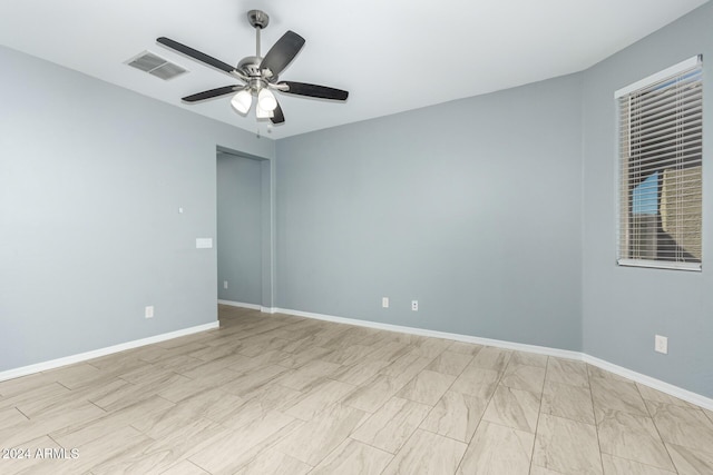 19034 W Yucatan Dr, Surprise, AZ 85388 - empty room featuring ceiling fan and baseboards
