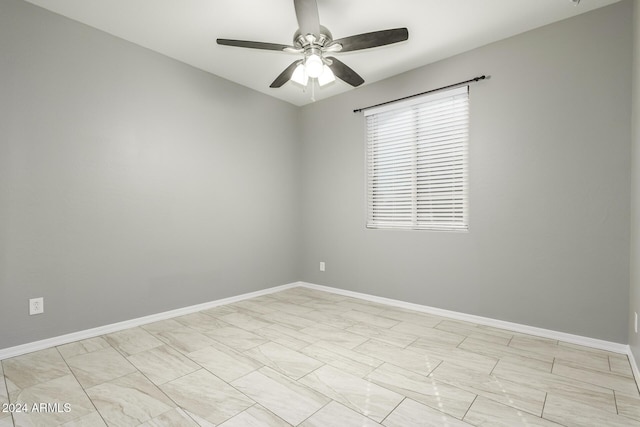 19034 W Yucatan Dr, Surprise, AZ 85388 - unfurnished room featuring ceiling fan and baseboards