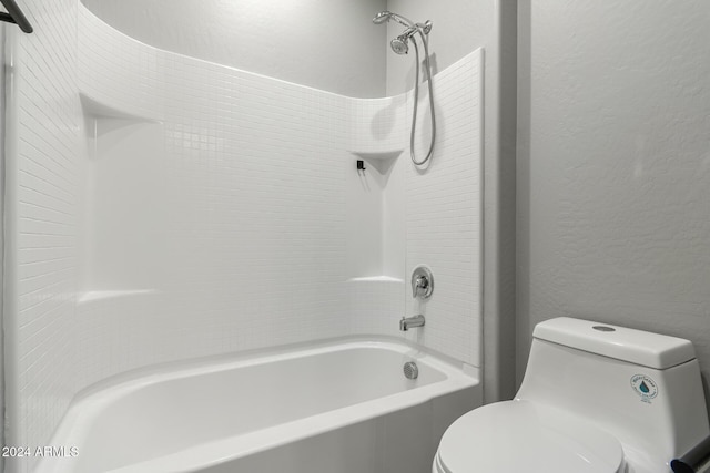 19034 W Yucatan Dr, Surprise, AZ 85388 - bathroom with a textured wall, toilet, and shower / bath combination