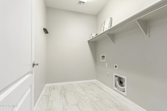 washroom with hookup for an electric dryer, hookup for a washing machine, and gas dryer hookup