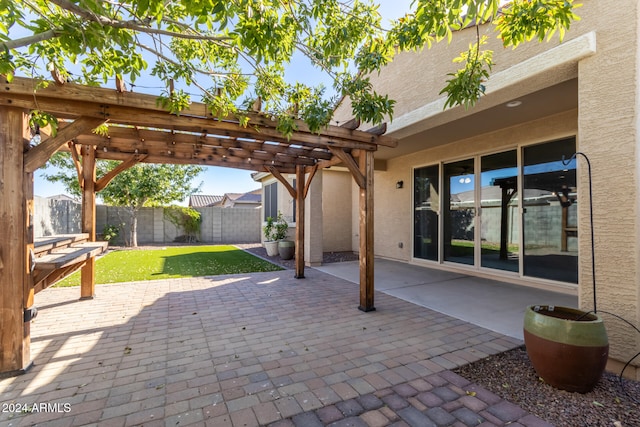 view of patio featuring a pergola