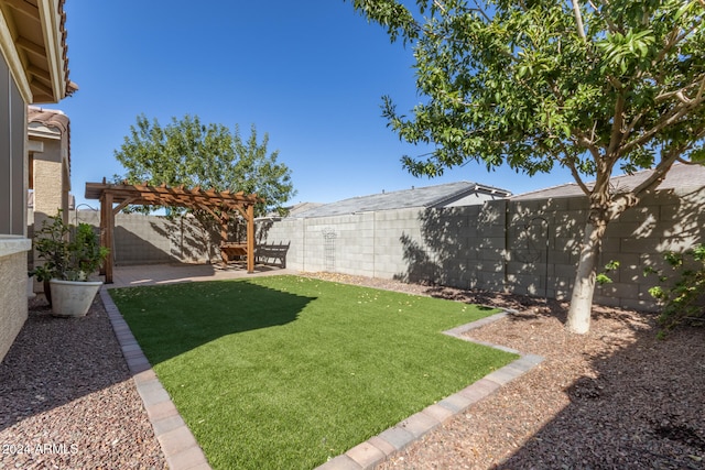 view of yard with a patio area and a pergola