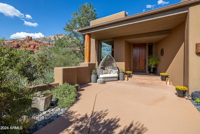 view of patio / terrace featuring a mountain view
