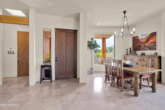 dining room featuring recessed lighting and a notable chandelier