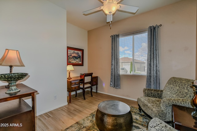 12935 E Ramos St, Dewey, AZ 86327 - living area with light wood finished floors, a ceiling fan, and baseboards