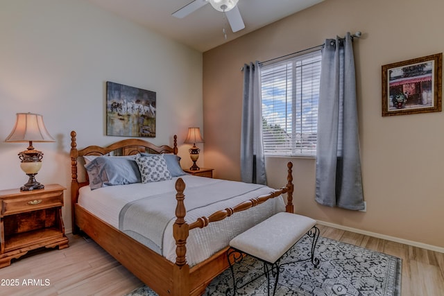 12935 E Ramos St, Dewey, AZ 86327 - bedroom with light wood-type flooring, baseboards, and ceiling fan