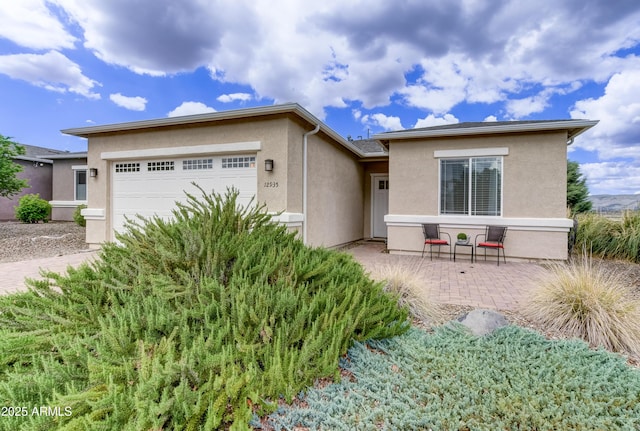 12935 E Ramos St, Dewey, AZ 86327 - single story home featuring stucco siding and a garage
