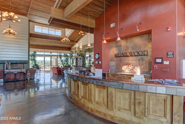 12935 E Ramos St, Dewey, AZ 86327 - welcome area featuring wood ceiling with exposed beams, high vaulted ceiling, and a chandelier
