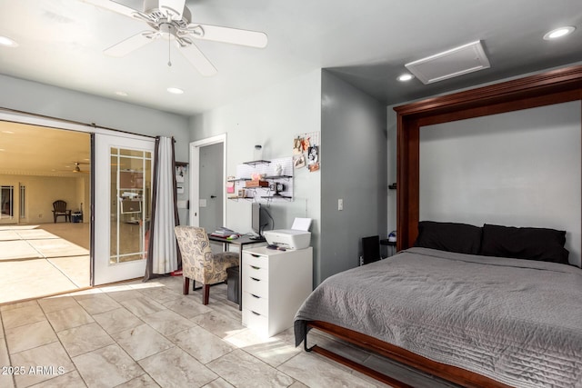 bedroom featuring ceiling fan and french doors