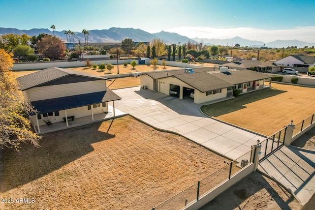 drone / aerial view featuring a mountain view