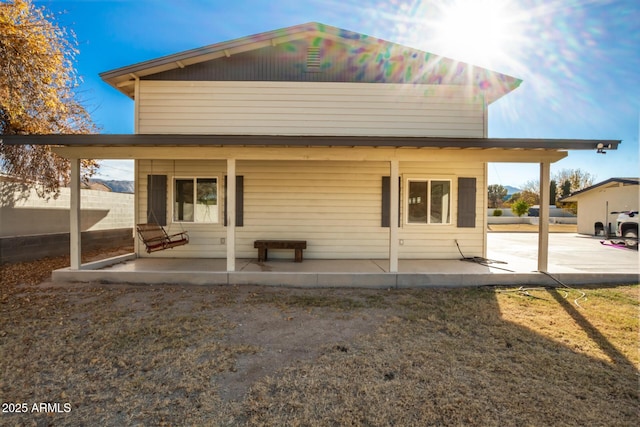 rear view of property with a patio