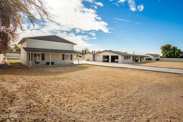 back of property with covered porch