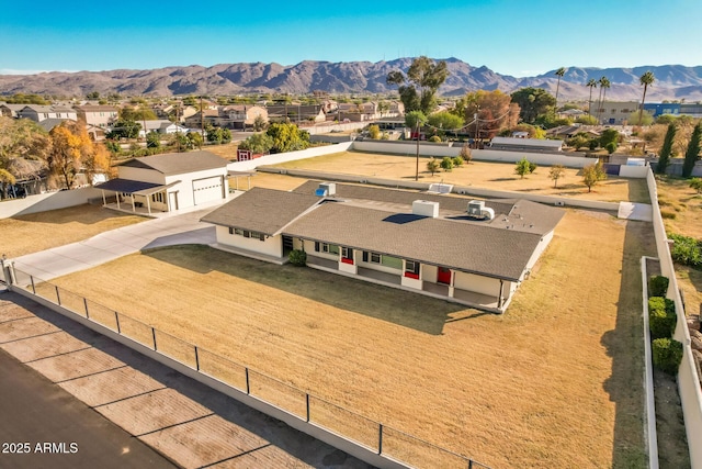 drone / aerial view featuring a mountain view