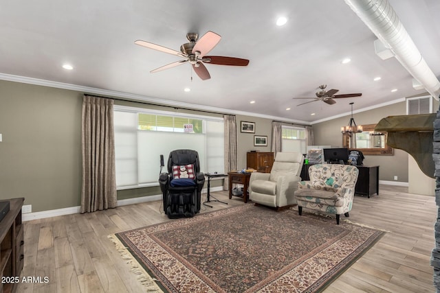 living room with ceiling fan, crown molding, and light hardwood / wood-style flooring