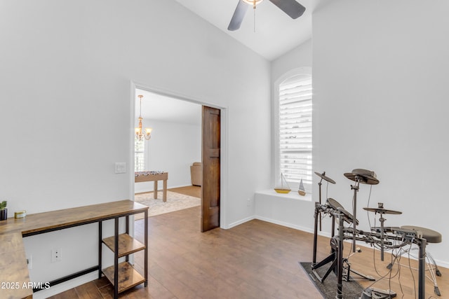 4301 E Abraham Ln, Phoenix, AZ 85050 - office space with wood finished floors, healthy amount of natural light, ceiling fan, a chandelier, and high vaulted ceiling