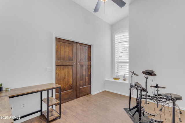 4301 E Abraham Ln, Phoenix, AZ 85050 - office area featuring vaulted ceiling, a ceiling fan, wood finished floors, and healthy amount of natural light