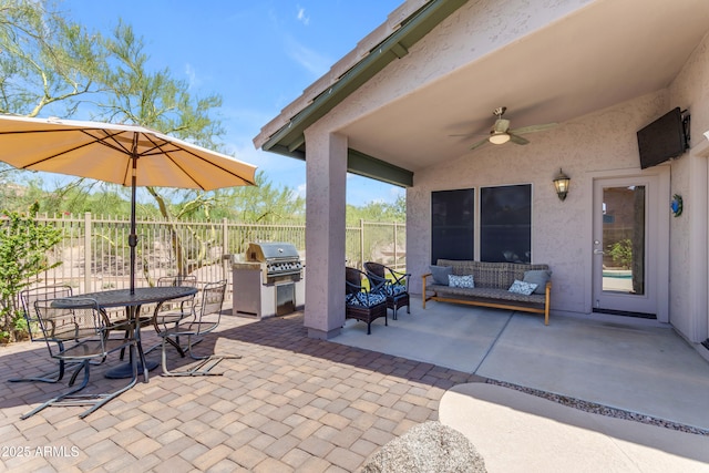 4301 E Abraham Ln, Phoenix, AZ 85050 - view of patio featuring ceiling fan, outdoor dining space, outdoor lounge area, and exterior kitchen