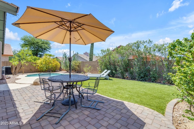 4301 E Abraham Ln, Phoenix, AZ 85050 - fenced backyard featuring a patio area and outdoor dining area
