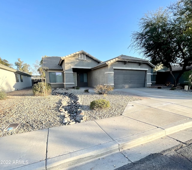 view of front of home with a garage