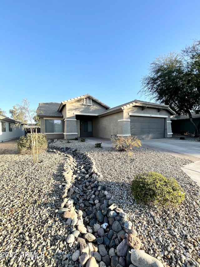 single story home with a garage